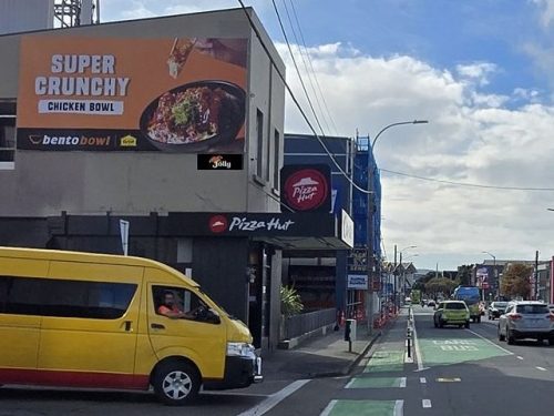 This Billboard Site located on Pizza Hut on multi- laned Adelaide Road and King St corner reaches inbound audiences from Newtown, Berhampore, Island Bay enroute to the CBD. Heavy traffic backed up along this stretch ensures long dwell times. Nearby businesses include Pizza Hut, St Pierres, McDonalds, BP, Bridgestone, Jaycar, Repco. Massey University and The Basin Reserve.