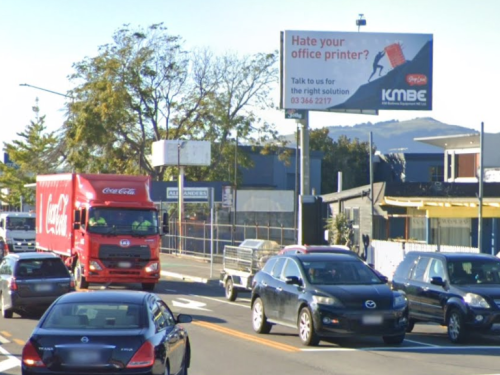 ferry road billboard east christchurch at intersection be jolly good billboards